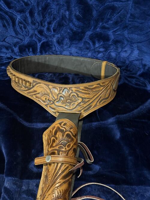 This is a custom leather cowboy rig. This did to hold Ruger super ...