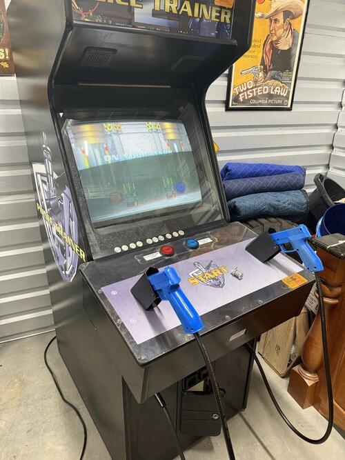 Police trainer arcade game. This fun full size arcade machine works ...