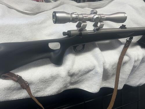 A Knight Wolverine 209 50 Caliber Blackpowder Rifle with thumb hole ...
